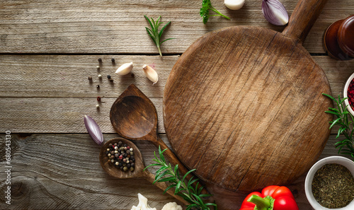 Menu background cutting board with spices and ingredients for preparation food top view