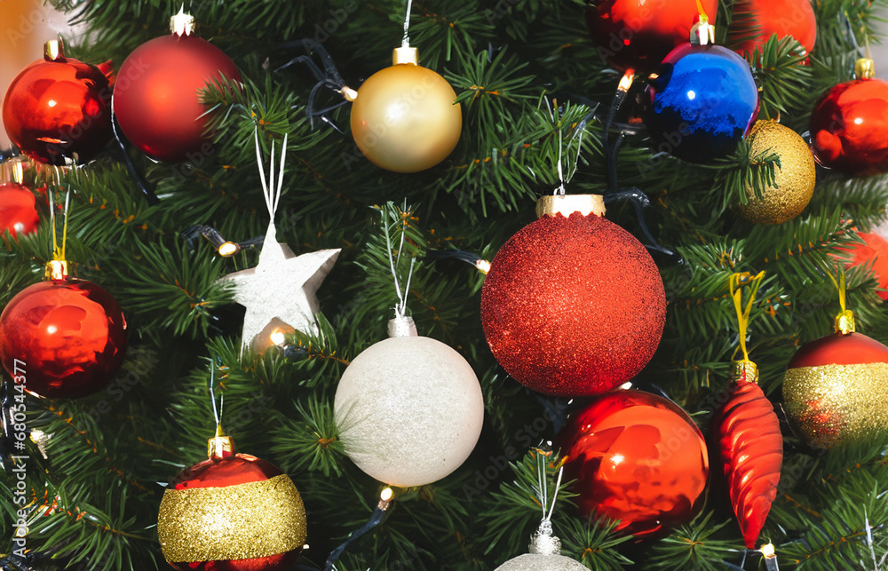 Naklejka premium christmas tree decorations with red, gold, blue and white balls