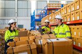 Engineer team shipping order detail on tablet export and import, goods, factory ,warehouse ,international trade ,transportation ,cargo ship ,logistic, distribution at logistics center.industry