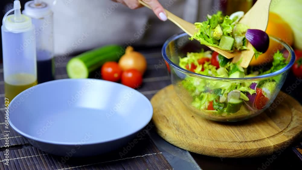 Mix fresh vegetable salad in glass bowl Mix fresh vegetable salad in glass bowl
