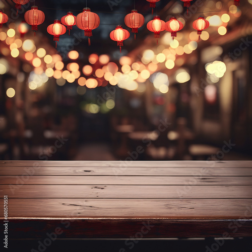 Dark wooden table top with blurred restaurant background chinese new year theme