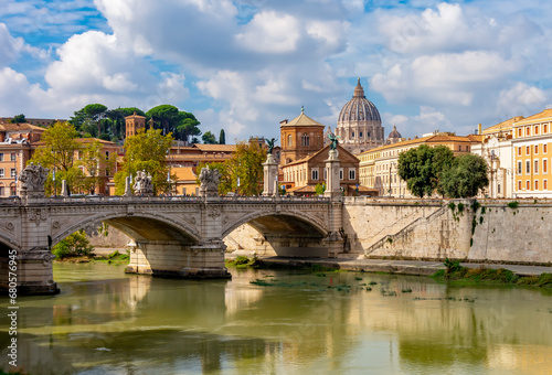 St Peter's basilica dome in Vatican and Victor Emmanuel II bridge over Tiber riber, Rome, Italy