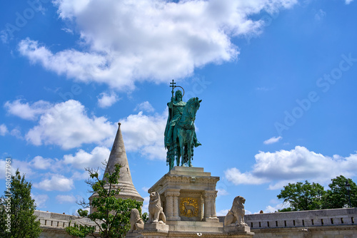 Statue of St. Stephen I (Szent István szobra) mounted on a horse at the 19th century fortress with panoramic views, Fisherman's Bastion (Halászbástya) in Budapest, Hungary. photo