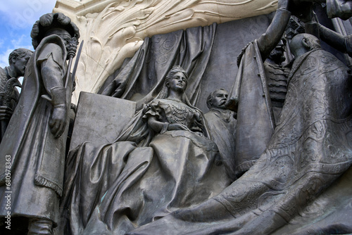 Gyula Andrassy statue close up of the bronze relief of the Coronation of 1867, in central Budapest, Hungary. photo