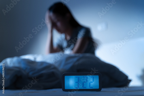 Anxiety disorder on insomnia woman concept, sleepless Woman open eye awakening on the bed at night time can\'t sleep from symptom of depression diseased.