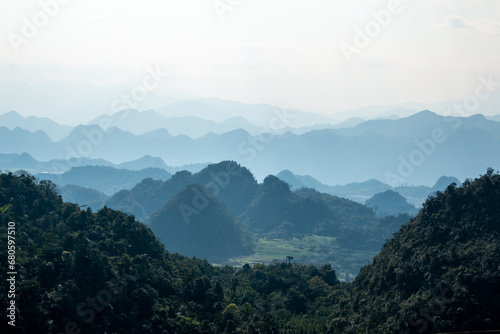 View from the Quan Ba Heaven Gate on the remote Ha Giang Loop road in Northern Vietnam across the mountainous region of the Dong Van Karst Plateau UNESCO Global Geopark