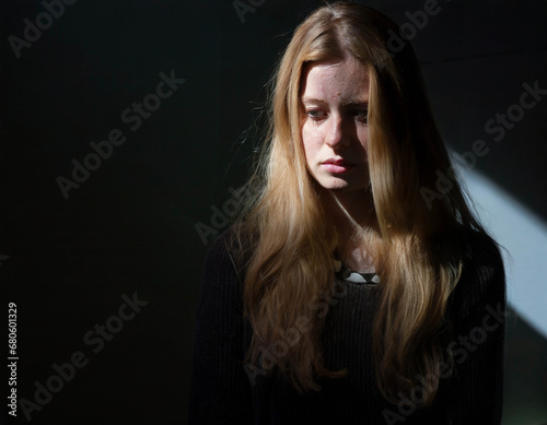 Portrait anxious and depressed young woman 
