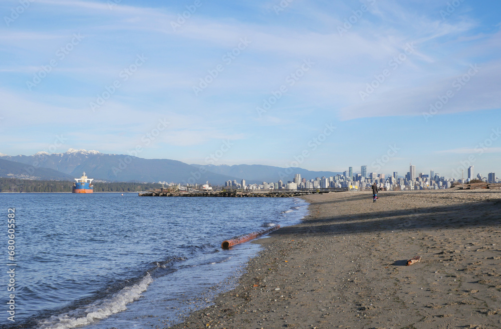Beautiful view of the skyline of Vancouver in the distance as seen from Jericho Beach in Vancouver, British Columbia, Canada
