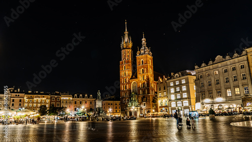 The main square of the old town in Krakow in the night lights.