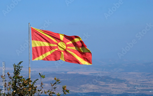 Obraz na płótnie The national flag of North Macedonia waving in the wind in Skopje