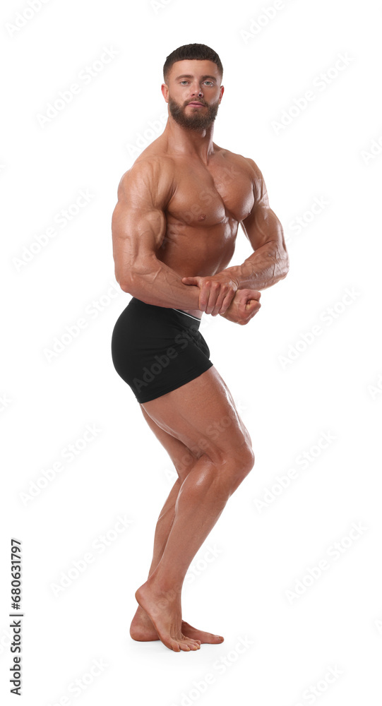 Young bodybuilder with muscular body on white background