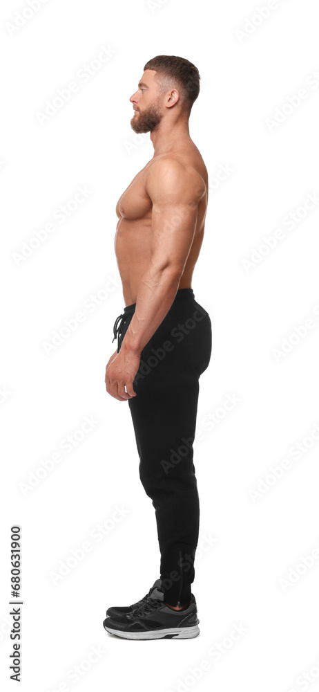 Fototapeta premium Young bodybuilder with muscular body on white background