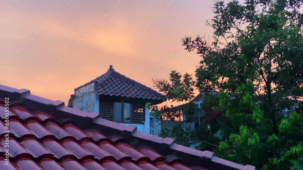 the view of the evening orange sky after rain the view of the evening orange sky after rain