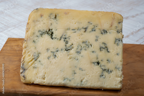Cheese collection, English semi-soft, crumbly old stilton blue cheese close up