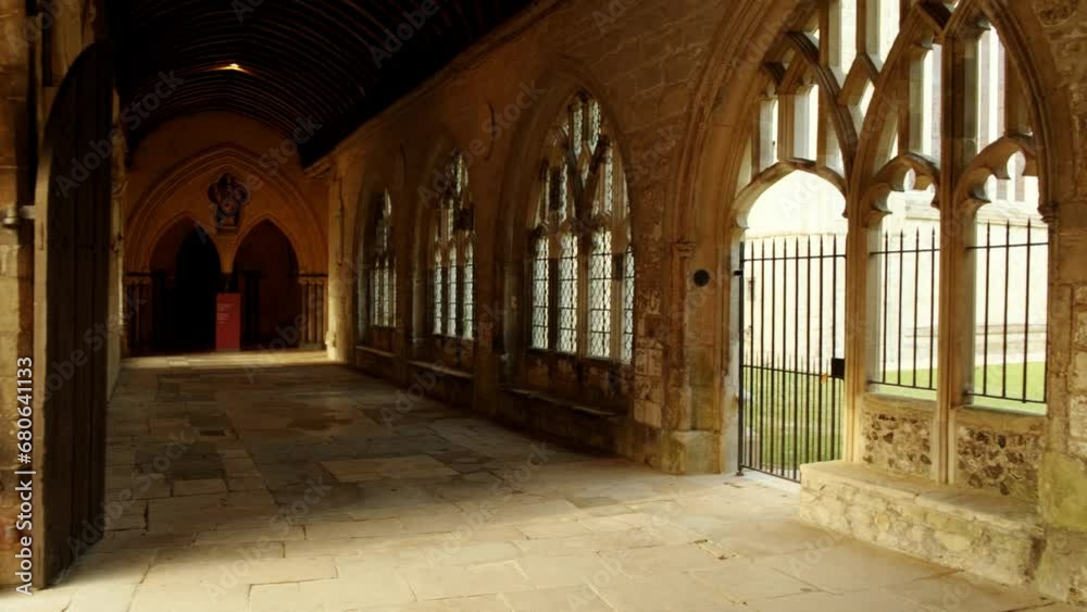 The cloister of Chichester Cathedral, in West Sussex, England, UK founded in 1075 featuring both Norman and Gothic architecture The cloister of Chichester Cathedral, in West Sussex, England, UK founded in 1075 featuring both Norman and Gothic architecture