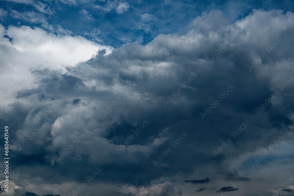 The sky is adorned with clouds of various shapes and sizes. The sky is adorned with clouds of various shapes and sizes.