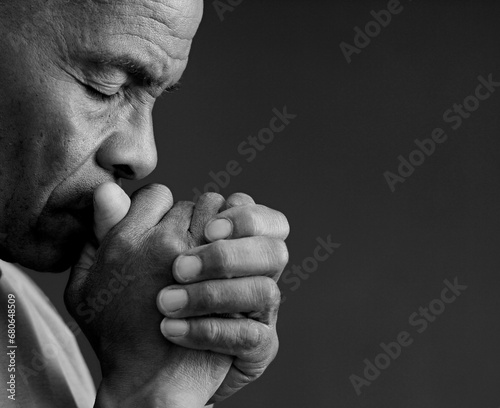 man praying to god on gray background with people stock image stock photo 
