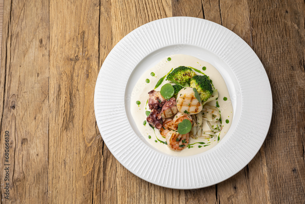Grilled seafood with broccoli and sauce Grilled seafood with broccoli and sauce