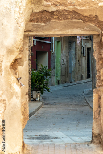 Fototapeta Naklejka Na Ścianę i Meble -  Entrance door to the alley, in Cocentaina, Alicante (Spain)