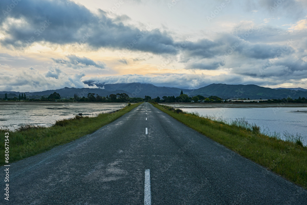 road to the mountains at sunset road to the mountains at sunset