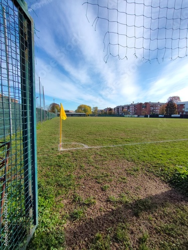 football in a winter field with muddy ground