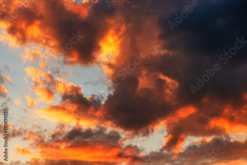 Dramatic sky in summer sunset with vibrant clouds