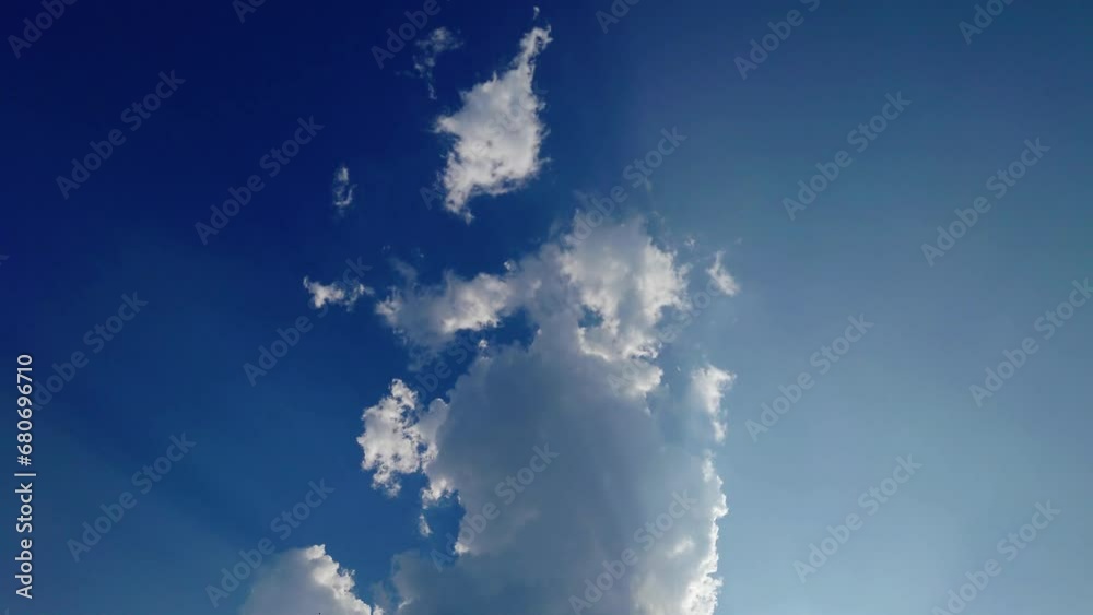 timelapse of a blue sky with beautiful white clouds transforming in a dramatic way timelapse of a blue sky with beautiful white clouds transforming in a dramatic way