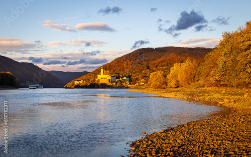 Schoenbuehel castle at the riverbank of the river Danube in Austria in evening light in autumn © Photofex