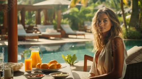 american woman in restaurant in the hotel  pool background