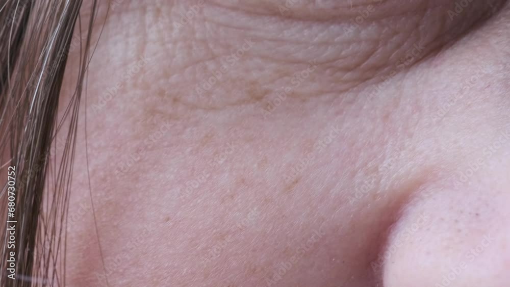 Close-up of eye of middle-aged woman with wrinkles on eyelids, Embracing Aging concept, Aging Eyes' Skin, Women's Health, Capturing Age-Related Changes Close-up of eye of middle-aged woman with wrinkles on eyelids, Embracing Aging concept, Aging Eyes' Skin, Women's Health, Capturing Age-Related Changes