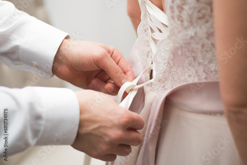 Bride and Groom Holding Hands in Wedding Ceremony