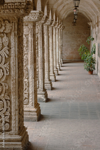 Perspective of carved columns in the Cloister of the La Compania Church, Arequipa, Peru. 17th century. photo
