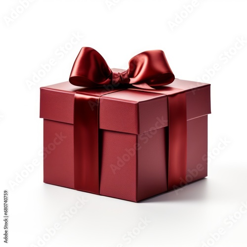 Red gift box with red ribbon isolated on white background © D.Myts