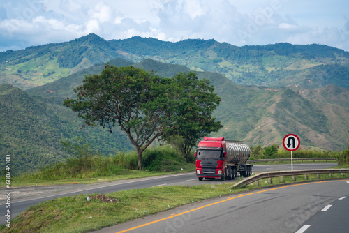 Fuel transport truck going up a road between mountains in the Valle del cauca. Colombia. © EGT