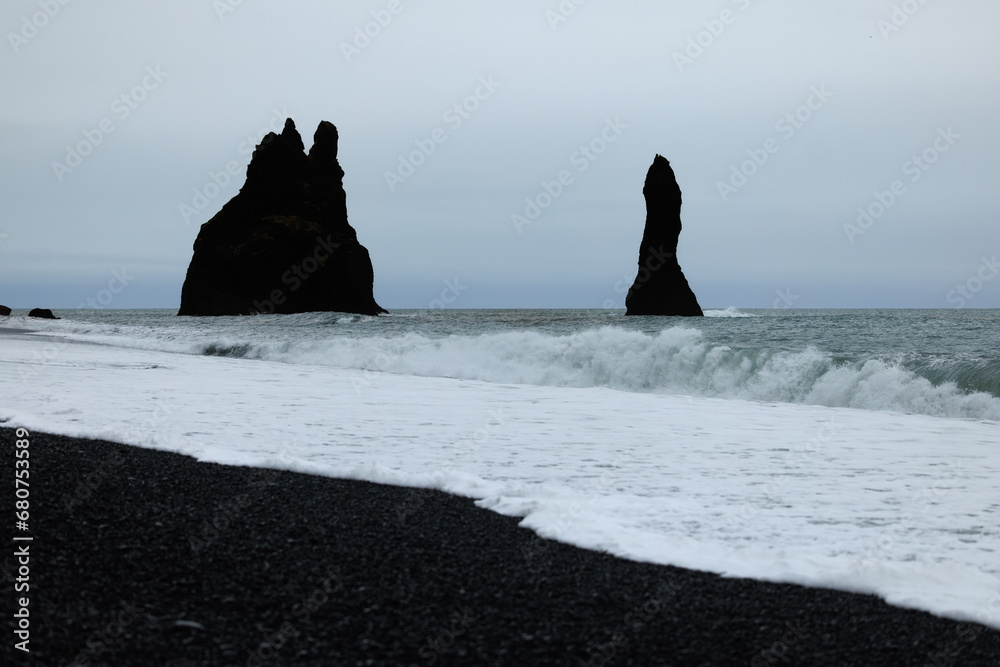 waves crashing on the black sand Reynisfjara Beach, Iceland