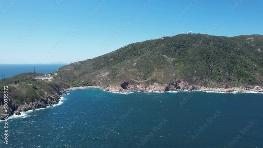 Aerial drone shot of a rocky mountain geological formations in Hong Kong Cape D Aguilar with ocean view on sunny near Stanley, Shek O and Repluse Bay Aerial drone shot of a rocky mountain geological formations in Hong Kong Cape D Aguilar with ocean view on sunny near Stanley, Shek O and Repluse Bay