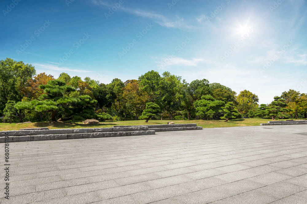 .Empty tiles floor at the nice and peaceful comfortable great nature park panorama..