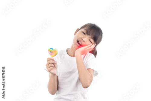 Asian little girl has toothache and hand holding Lollipop isolated on white background with clipping path.