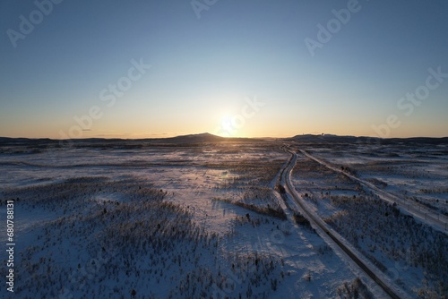 Last light of day stretches over the tranquil  frosty landscape of Krokvik.