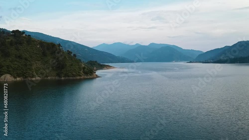 Aerial view of Tihari Lake filling up after the construction of the New Tehri hydroelectric Project Dam on the river Ganga in Tehri Garhwal Uttarakhand. photo