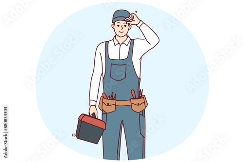 Smiling young maintenance worker in uniform with tools in hands. Happy male repairman or mechanic with box of instruments and equipment. Vector illustration.