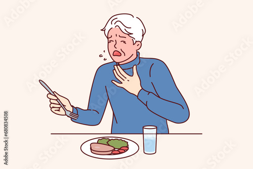 Man choked eating and coughed needing help and blushing feeling lack of air. Elderly person is choking and experiencing problems due to allergy to foodstuffs or poor quality dish served in restaurant