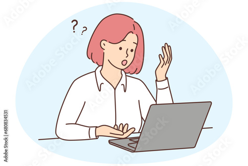 Woman look at laptop screen confused with problem