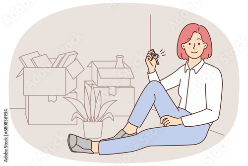 Happy woman holding keys to new home