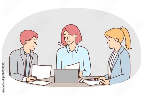 Businesspeople brainstorming at meeting in office
