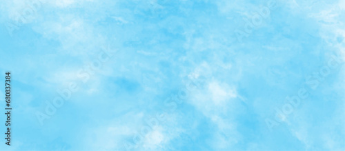 Natural clouds cape is surrounding on blue sky, Sky clouds with brush painted blue watercolor texture, small and large clouds alternating and moving slowly on cloudy winter morning sky.