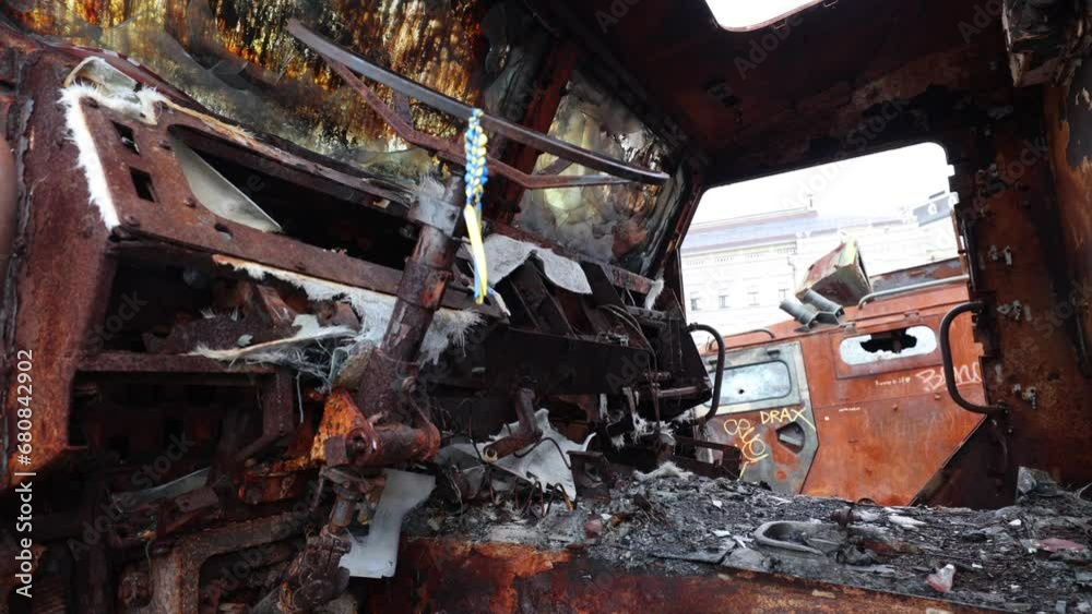 War Exhibition at Sophia Square in Kyiv Ukraine - Inside Driver's Seat of Destroyed Russian Tigr Vehicle War Exhibition at Sophia Square in Kyiv Ukraine - Inside Driver's Seat of Destroyed Russian Tigr Vehicle
