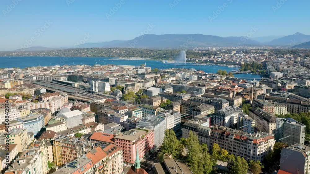 Geneva City And Harbor With Iconic Water Jet In Switzerland. - helicopter shot Geneva City And Harbor With Iconic Water Jet In Switzerland. - helicopter shot