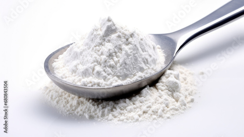 Creatine in measuring spoon isolated on white background, sport nutrition, bodybuilding food supplements.