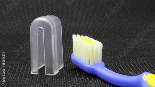 Close up blue toothbrush with cover